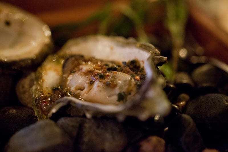 Grilled oyster with tequila and sage Grilled oyster with tequila and sage
